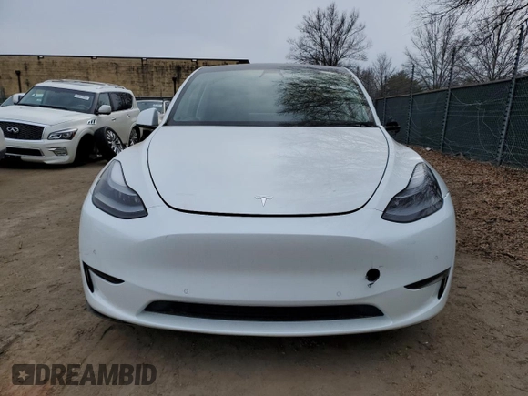 2022 Tesla Model Y Performance with VIN 7SAYGDEF7NF311990, listed as a Copart auction lot 43705395 with 25,651 mi miles and Salvage Title. Bid and sale history available at DreamBid. Image 5.
