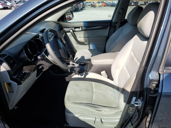 2011 Kia Sorento LX with VIN 5XYKT3A11BG154397, listed as a Copart auction lot 51229365 with 149,922 mi miles and Salvage Title. Bid and sale history available at carsss.com. Image 7.