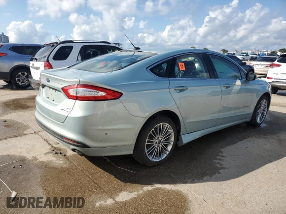 2013 Ford Fusion SE Hybrid with VIN 3FA6P0LUXDR375782, listed as a Copart auction lot 61994215 with Not provided miles and Non repairable. Bid and sale history available at DreamBid. Image 3.