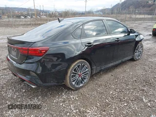 2023 Kia Forte GT with VIN 3KPF44AC4PE607003, listed as a IAAI auction lot 41628064 with 33,844 mi miles and . Bid and sale history available at carsss.com. Image 4.