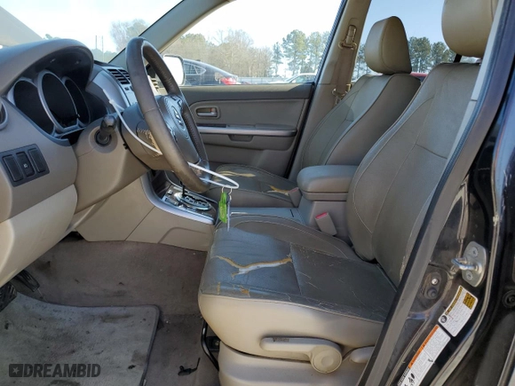 2007 Suzuki Grand Vitara Luxury with VIN JS3TE947574202136, listed as a Copart auction lot 46878965 with 180,591 mi miles and Salvage Title. Bid and sale history available at carsss.com. Image 7.
