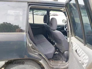 1999 Toyota RAV4 with VIN JT3HP10V2X7120498, listed as a IAAI auction lot 42409235 with 215,769 mi miles and . Bid and sale history available at DreamBid. Image 8.