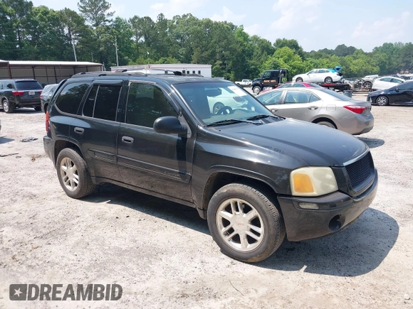 2002 GMC Envoy SLT z VIN 1GKDS13S122349095, wystawiony jako IAAI lot #42402767 z przebiegiem 211 071 mil mil oraz . Historia ofert i sprzedaży dostępna na DreamBid. Obrazek 1.