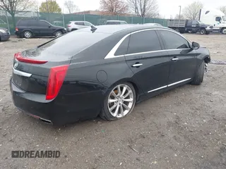 2014 Cadillac XTS Luxury with VIN 2G61M5S36E9248122, listed as a IAAI auction lot 42012167 with 188,458 mi miles and . Bid and sale history available at DreamBid. Image 4.