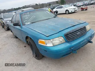2000 Ford Crown Victoria Police Police Interceptor with VIN 2FAFP71W4YX136846, listed as a IAAI auction lot 41715363 with 335,956 mi miles. Bid and sale history available at carsss.com. Image 1.