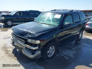 2002 Chevrolet Tahoe LT with VIN 1GNEC13Z32R299695, listed as a IAAI auction lot 41721527 with 230,544 mi miles. Bid and sale history available at carsss.com. Image 2.
