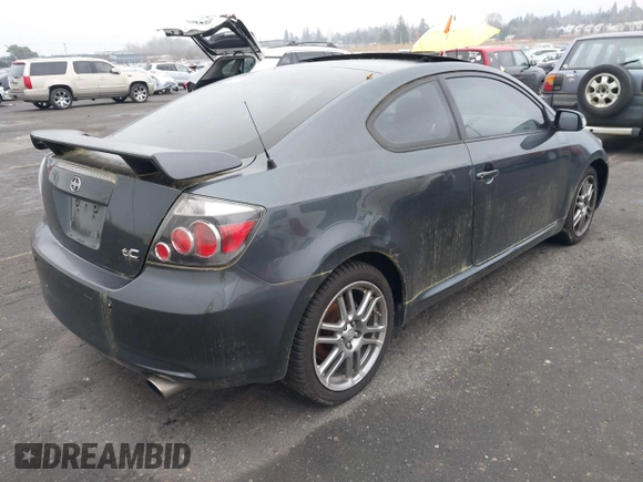2010 Scion tC with VIN JTKDE3B75A0314185, listed as a IAAI auction lot 41369224 with 164,244 mi miles. Bid and sale history available at carsss.com. Image 4.