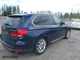 2015 BMW X5 xDrive35d with VIN 5UXKS4C55F0J98874, listed as a IAAI auction lot 42030583 with 151,079 mi miles. Bid and sale history available at carsss.com. Image 4.