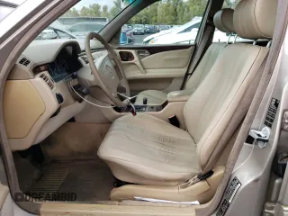 1998 Mercedes-Benz E-Class with VIN WDBJH82F7WX010567, listed as a Copart auction lot 79104764 with 335,751 mi miles and Clean Title. Bid and sale history available at carsss.com. Image 7.