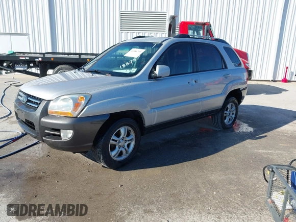 2006 Kia Sportage LX with VIN KNDJF723167188787, listed as a IAAI auction lot 41886395 with 312,426 mi miles and . Bid and sale history available at carsss.com. Image 2.