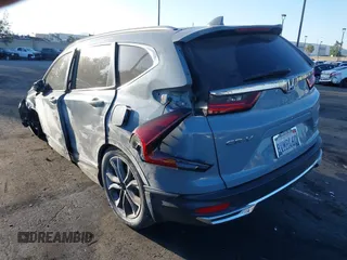 2021 Honda CR-V Touring with VIN 7FART6H97ME010816, listed as a IAAI auction lot 42256962 with 86,223 mi miles and . Bid and sale history available at DreamBid. Image 3.
