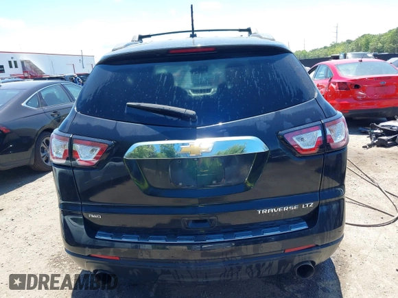 2015 Chevrolet Traverse LTZ with VIN 1GNKVJKDXFJ279029, listed as a IAAI auction lot 39694033 with 151,241 mi miles and . Bid and sale history available at DreamBid. Image 16.