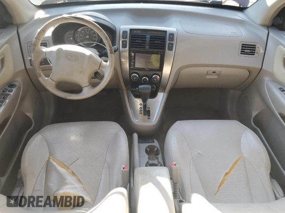 2005 Hyundai Tucson GLS with VIN KM8JN12D15U141358, listed as a Copart auction lot 73715334 with 173,503 mi miles and Salvage Title. Bid and sale history available at carsss.com. Image 8.