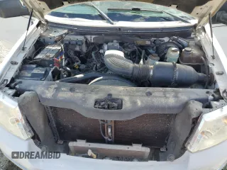 2004 Ford F-150 STX z VIN 1FTRX12WX4NA69734, wystawiony jako Copart lot #62692495 z przebiegiem 134 678 mil mil oraz Szkoda całkowita • Salvage title. Historia ofert i sprzedaży dostępna na DreamBid. Obrazek 11.