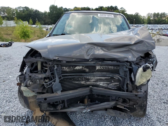 2006 Mazda Tribute S with VIN 4F2YZ06186KM08378, listed as a Copart auction lot 69391894 with Not Provided miles and Salvage Title. Bid and sale history available at DreamBid. Image 5.