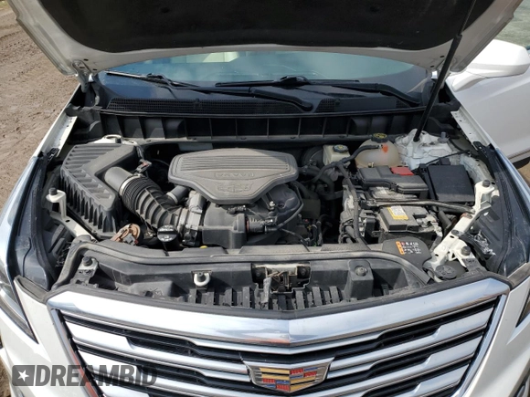 2017 Cadillac XT5 FWD with VIN 1GYKNARS0HZ157551, listed as a Copart auction lot 55281725 with 144,077 mi miles and Clean title. Bid and sale history available at DreamBid. Image 12.