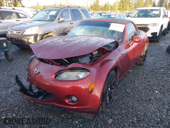 2006 Mazda MX-5 Miata Grand Touring with VIN JM1NC25F260122129, listed as a IAAI auction lot 41227010 with 170,780 mi miles and . Bid and sale history available at DreamBid. Image 2.