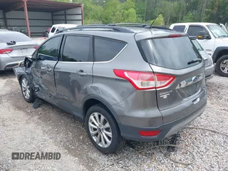 2013 Ford Escape SEL with VIN 1FMCU0HX4DUC83404, listed as a IAAI auction lot 41285095 with 199,024 mi miles. Bid and sale history available at carsss.com. Image 3.