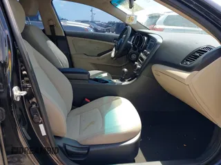 2014 Kia Optima LX with VIN 5XXGM4A78EG296882, listed as a IAAI auction lot 42126103 with 148,004 mi miles. Bid and sale history available at carsss.com. Image 5.