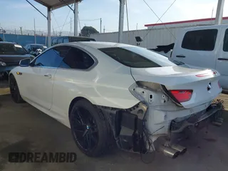 2012 BMW 6 Series 650i with VIN WBALX3C52CC528401, listed as a IAAI auction lot 42046910 with 105,844 mi miles. Bid and sale history available at carsss.com. Image 3.