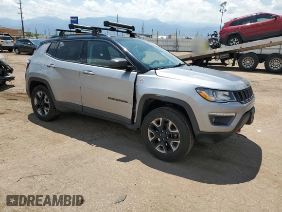 2017 Jeep Compass Trailhawk with VIN 3C4NJDDB1HT646751, listed as a Copart auction lot 62583555 with 99,974 mi miles and Salvage title. Bid and sale history available at DreamBid. Image 4.