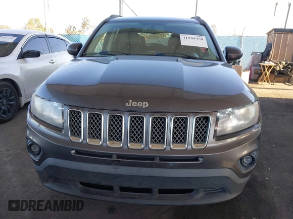 2016 Jeep Compass Latitude with VIN 1C4NJDEB2GD685383, listed as a IAAI auction lot 41968450 with 273,938 mi miles. Bid and sale history available at carsss.com. Image 12.