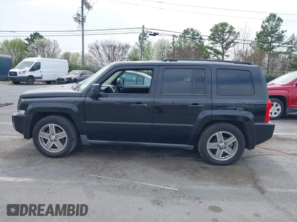 2008 Jeep Patriot Sport with VIN 1J8FT28WX8D711353, listed as a IAAI auction lot 41793321 with 161,777 mi miles. Bid and sale history available at carsss.com. Image 14.