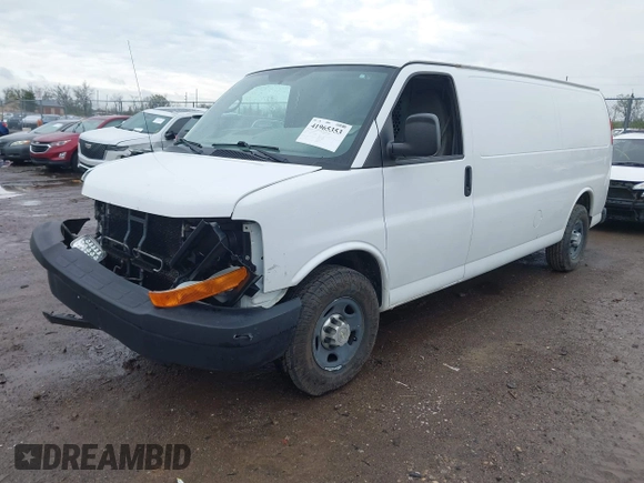 2014 Chevrolet Express Cargo Van with VIN 1GCWGGCA0E1155572, listed as a IAAI auction lot 41965353 with 324,538 mi miles. Bid and sale history available at carsss.com. Image 2.