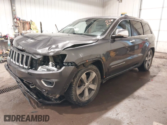 2015 Jeep Grand Cherokee Overland z VIN 1C4RJFCG1FC663469, wystawiony jako IAAI lot #41666113 z przebiegiem 140 159 mil mil oraz . Historia ofert i sprzedaży dostępna na DreamBid. Obrazek 17.
