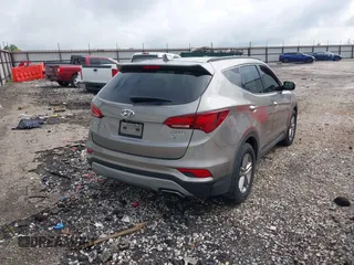 2018 Hyundai Santa Fe 2.4L with VIN 5NMZU3LB1JH100507, listed as a IAAI auction lot 42182116 with 103,826 mi miles and . Bid and sale history available at DreamBid. Image 4.