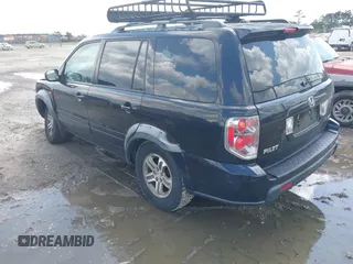 2006 Honda Pilot EX-L with VIN 2HKYF18506H530715, listed as a IAAI auction lot 42195804 with 252,295 mi miles and . Bid and sale history available at DreamBid. Image 3.