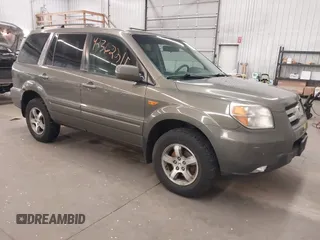 2007 Honda Pilot EX-L z VIN 2HKYF185X7H505077, wystawiony jako IAAI lot #42362215 z przebiegiem 174 592 mil mil oraz . Historia ofert i sprzedaży dostępna na DreamBid. Obrazek 1.