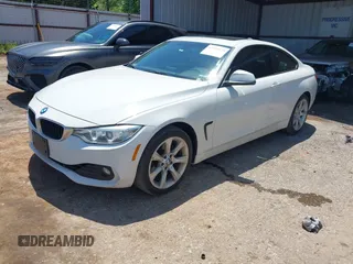 2015 BMW 4 Series 428i xDrive with VIN WBA3N5C58FK198596, listed as a IAAI auction lot 42514820 with 107,261 mi miles and . Bid and sale history available at DreamBid. Image 2.