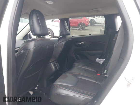 2016 Jeep Cherokee Trailhawk with VIN 1C4PJMBS4GW179121, listed as a IAAI auction lot 42516635 with 110,056 mi miles and . Bid and sale history available at DreamBid. Image 8.