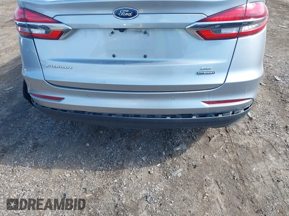 2020 Ford Fusion SE z VIN 3FA6P0LU8LR163896, wystawiony jako IAAI lot #41994803 z przebiegiem 89 892 mil mil oraz . Historia ofert i sprzedaży dostępna na DreamBid. Obrazek 19.