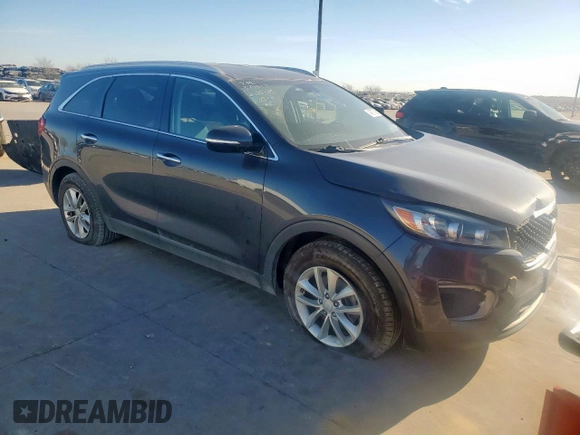 2017 Kia Sorento LX z VIN 5XYPG4A36HG211042, wystawiony jako Copart lot #48977085 z przebiegiem 130 892 mil mil oraz Szkoda całkowita • Salvage title. Historia ofert i sprzedaży dostępna na DreamBid. Obrazek 4.