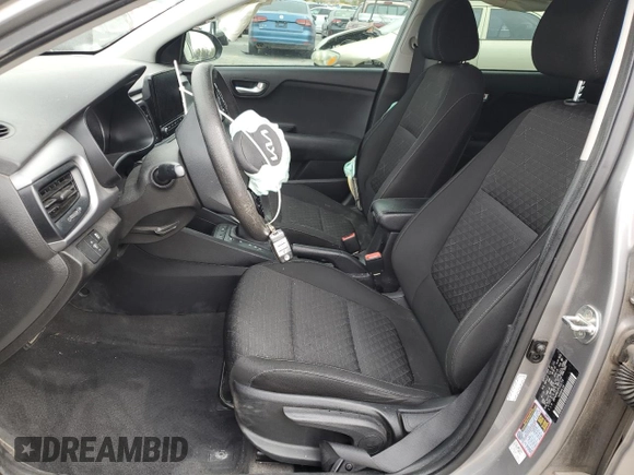 2023 Kia Rio S with VIN 3KPA24AD1PE552714, listed as a Copart auction lot 49243375 with 50,657 mi miles and Salvage Title. Bid and sale history available at carsss.com. Image 7.