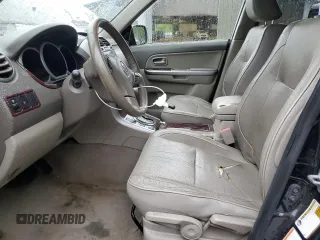 2006 Suzuki Grand Vitara Luxury with VIN JS3TD947364101307, listed as a Copart auction lot 55037585 with 198,616 mi miles and Salvage title. Bid and sale history available at DreamBid. Image 7.