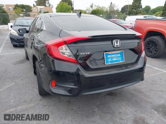 2016 Honda Civic Sedan EX-T with VIN 2HGFC1F34GH645220, listed as a IAAI auction lot 42043630 with 55,301 mi miles. Bid and sale history available at carsss.com. Image 3.