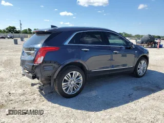 2018 Cadillac XT5 Premium Luxury FWD z VIN 1GYKNERS3JZ133029, wystawiony jako Copart lot #55932695 z przebiegiem 93 098 mil mil oraz Szkoda całkowita • Salvage title. Historia ofert i sprzedaży dostępna na DreamBid. Obrazek 3.