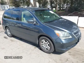 2005 Honda Odyssey EX-L with VIN 5FNRL38725B084980, listed as a IAAI auction lot 41917012 with 134,685 mi miles. Bid and sale history available at carsss.com. Image 1.