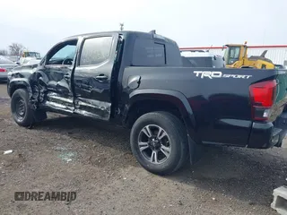 2018 Toyota Tacoma SR5 with VIN 3TMAZ5CN6JM055632, listed as a IAAI auction lot 40751593 with 125,663 mi miles and . Bid and sale history available at DreamBid. Image 3.