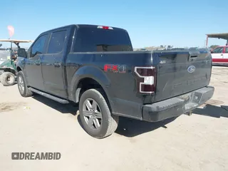 2018 Ford F-150 XL with VIN 1FTEW1E50JKE13640, listed as a IAAI auction lot 41228537 with 146,927 mi miles. Bid and sale history available at carsss.com. Image 3.