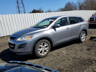 2011 Mazda CX-9 Touring z VIN JM3TB3CV6B0331966, wystawiony jako Copart lot #49517875 z przebiegiem 184 011 mil mil oraz Czysty tytuł • Clean title. Historia ofert i sprzedaży dostępna na DreamBid. Obrazek 1.
