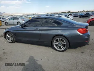 2014 BMW 4 Series 428i with VIN WBA3N7C55EF719924, listed as a Copart auction lot 74601284 with 57,165 mi miles and Clean Title. Bid and sale history available at carsss.com. Image 2.