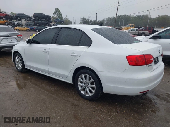 2014 Volkswagen Jetta Sedan SE w/Connectivity with VIN 3VWD07AJ7EM330558, listed as a IAAI auction lot 41353302 with 128,382 mi miles. Bid and sale history available at carsss.com. Image 3.