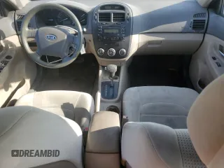 2009 Kia Spectra LX z VIN KNAFE222995618257, wystawiony jako Copart lot #56179025 z przebiegiem 270 087 mil mil oraz Szkoda całkowita • Salvage title. Historia ofert i sprzedaży dostępna na DreamBid. Obrazek 8.