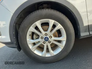 2017 Ford Escape SE z VIN 1FMCU0GD4HUB05330, wystawiony jako IAAI lot #42396863 z przebiegiem 66 420 mil mil oraz . Historia ofert i sprzedaży dostępna na DreamBid. Obrazek 14.
