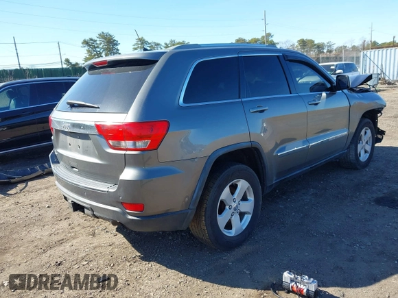 2012 Jeep Grand Cherokee Laredo with VIN 1C4RJFAG0CC145061, listed as a IAAI auction lot 41820140 with 185,015 mi miles. Bid and sale history available at carsss.com. Image 4.