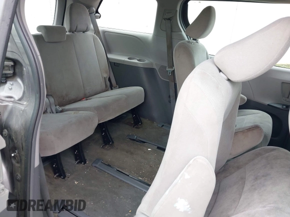 2015 Toyota Sienna L with VIN 5TDZK3DC8FS678539, listed as a IAAI auction lot 42115498 with 111,417 mi miles and . Bid and sale history available at DreamBid. Image 8.